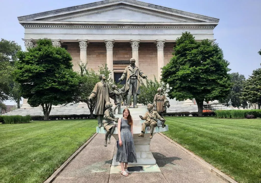 Julia Browning in front of a building. 